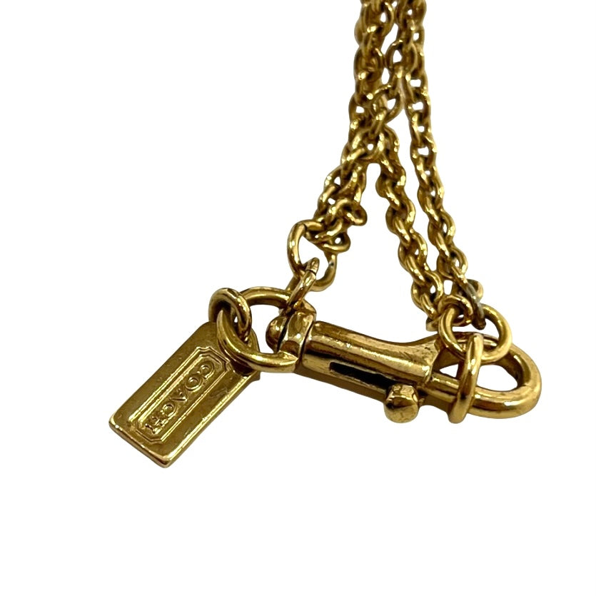 JUEGO DE COLLAR Y PULSERA COACH