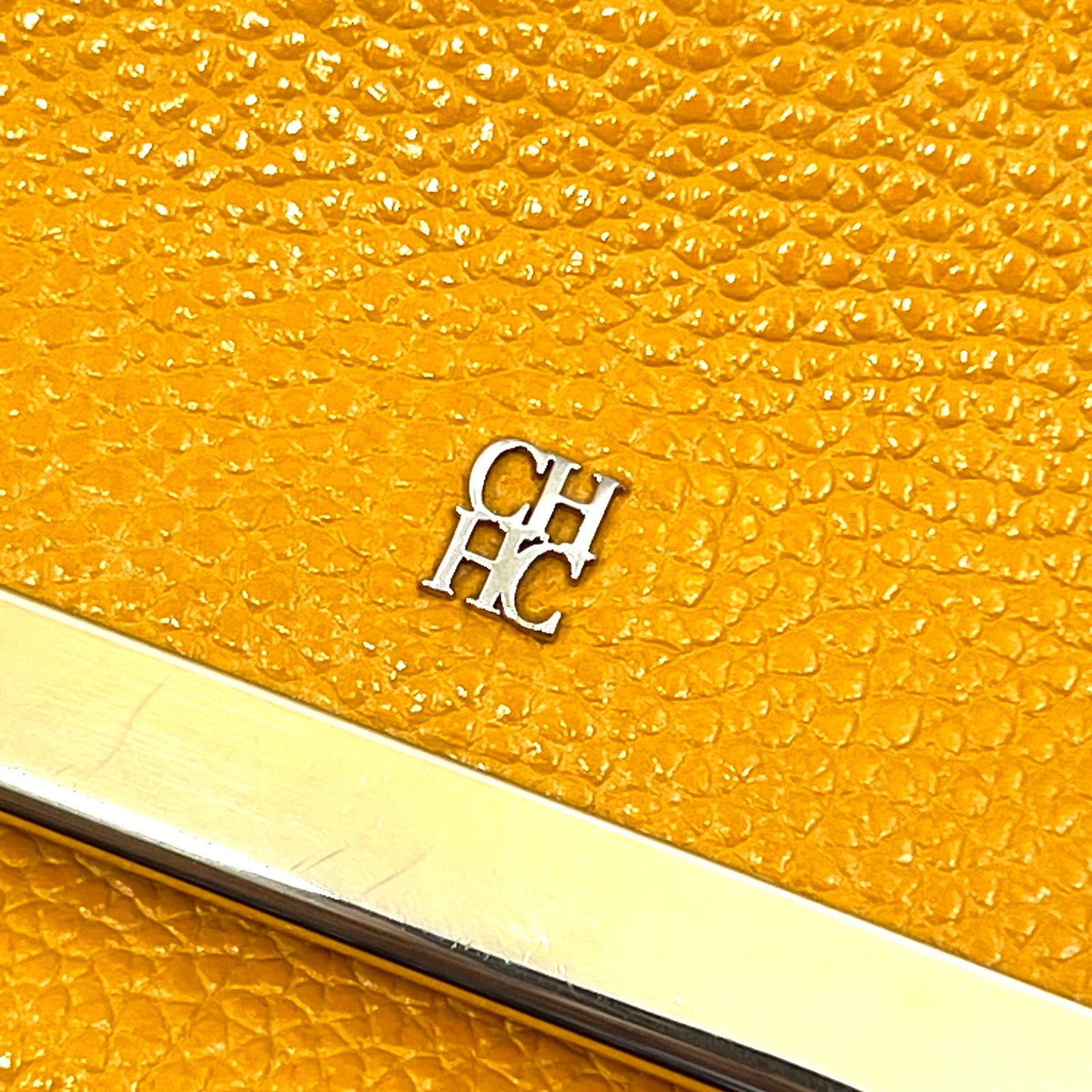 CLUTCH CAROLINA HERRERA
